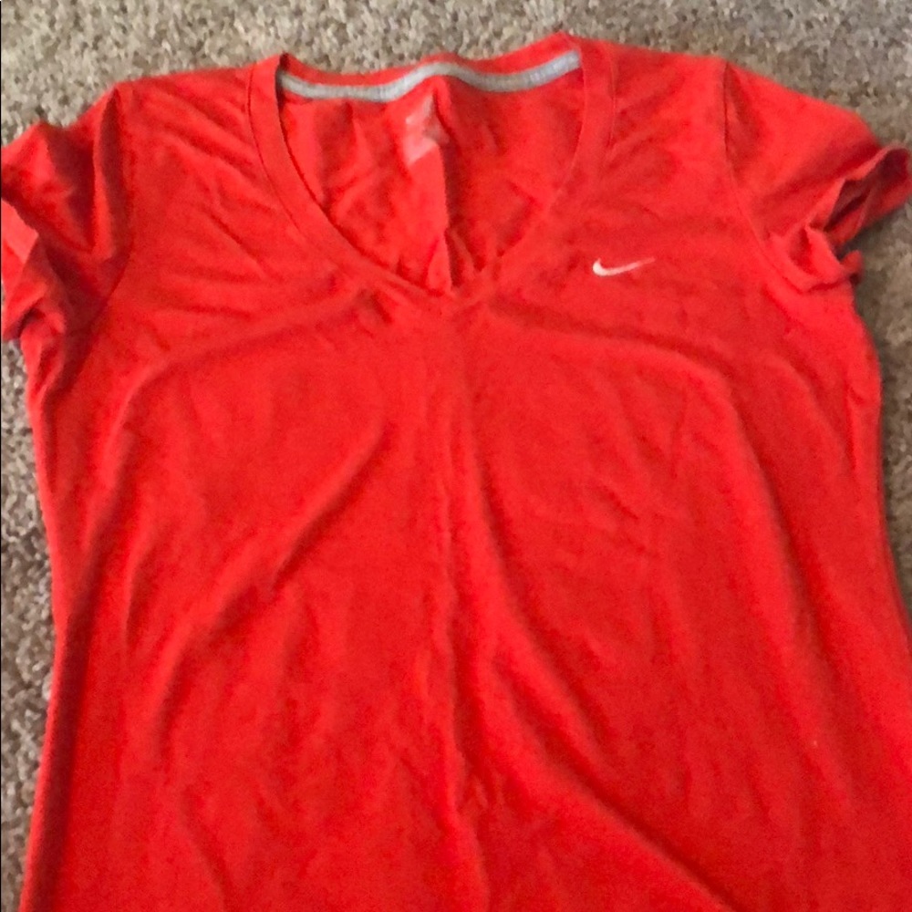 Women’s size medium Nike shirt.